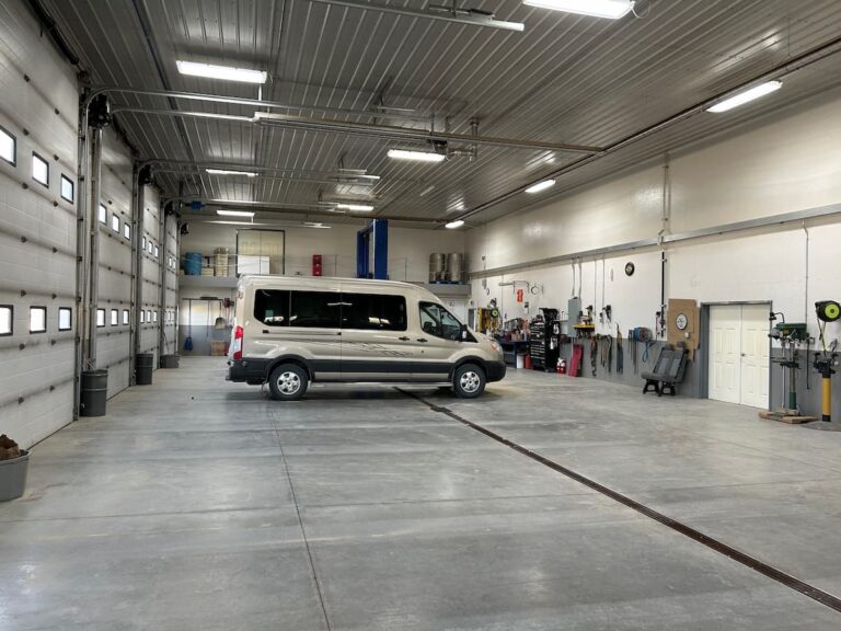 Clean Midwest workshop heated with Reflect-O-Ray infrared radiant tube heating showing dry floors and clear air